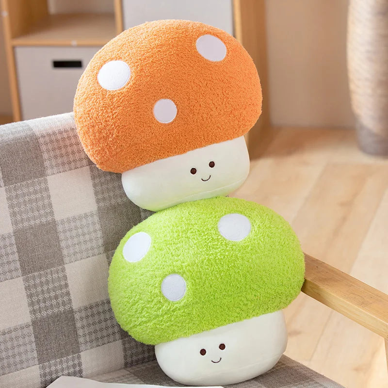 Two kawaii plush mushroom toys stacked on a checkered surface