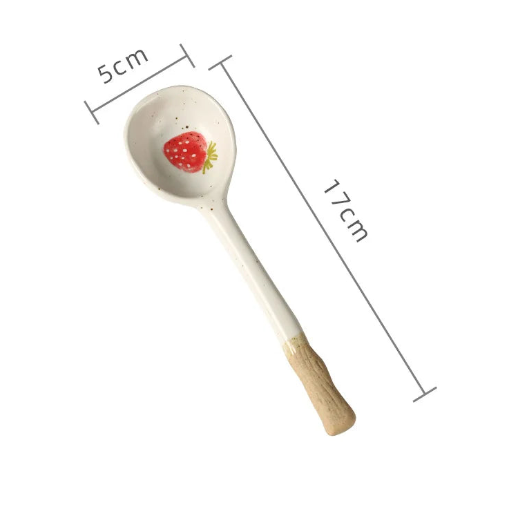 A white ceramic kawaii spoon with measurements