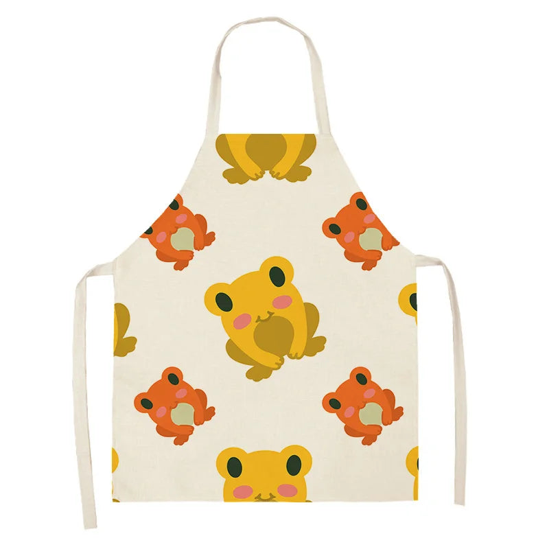 Children's kawaii apron with frog pattern on a white background
