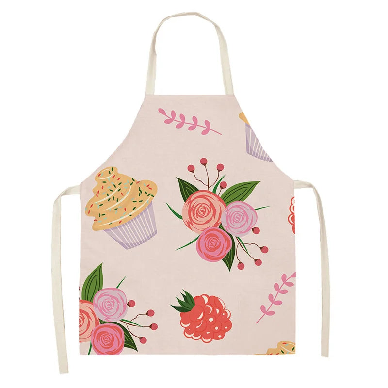 Children's kawaii apron with floral and cupcake design on a white background