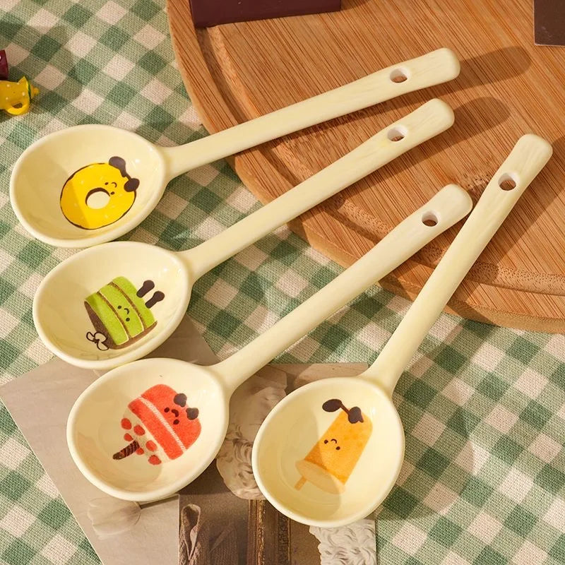 Four food cartoon designed kawaii spoons on a checked background
