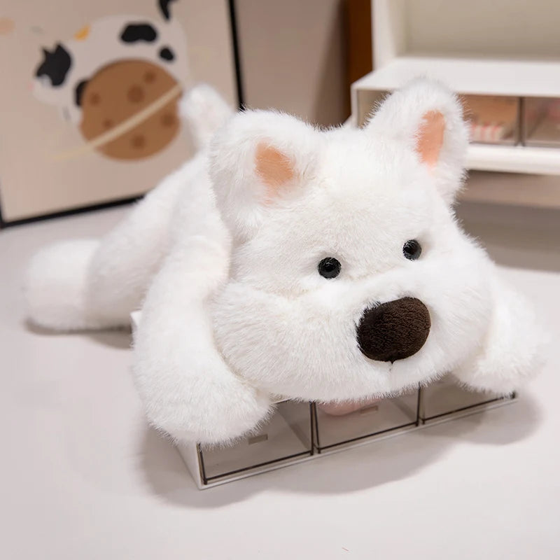 White kawaii plush toy resembling a dog on a white surface with a blurred background