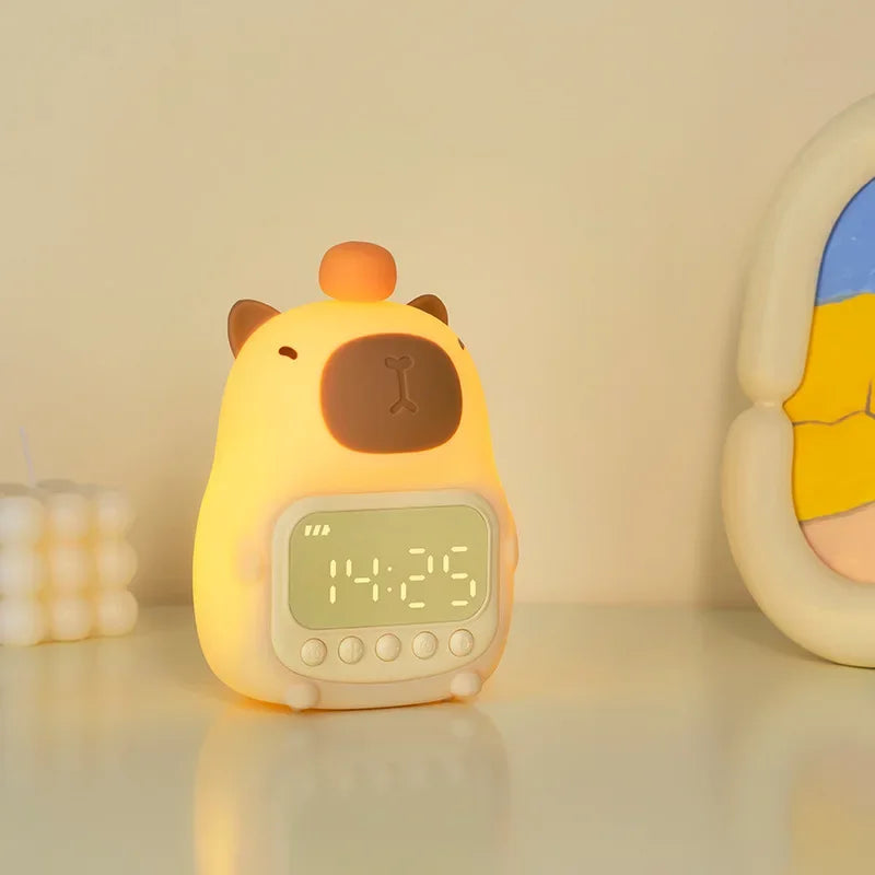 Cute animal-shaped kawaii digital clock on a shelf with a soft yellow background