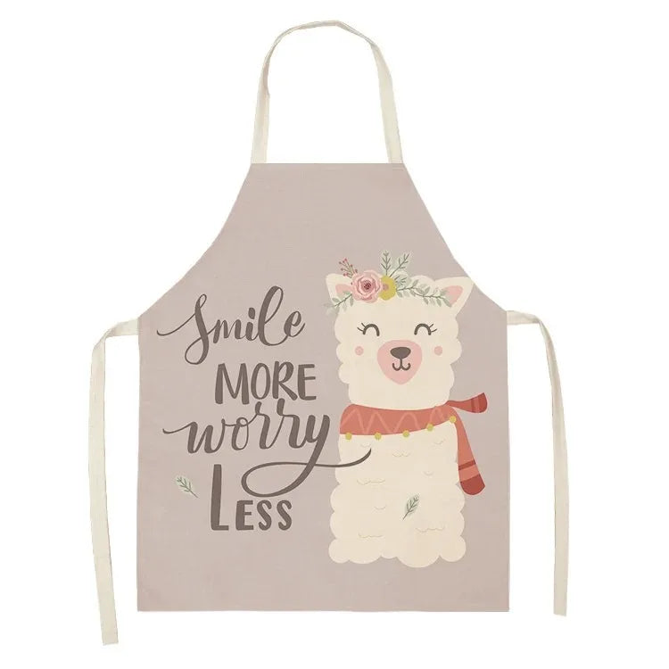 Apron with a Kawaii-designed llama illustration and 'Smile more, worry less' text on a beige background