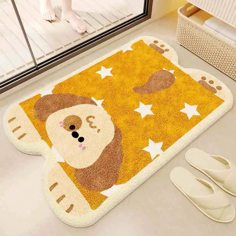 Yellow kawaii doormat with cartoon monkey design on a floor.