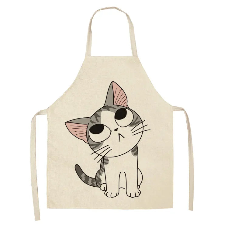 Beige kawaii apron with a cartoon cat design on a white background