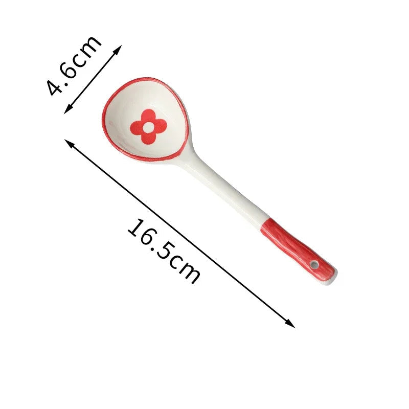 A red and white kawaii spoon on a white background