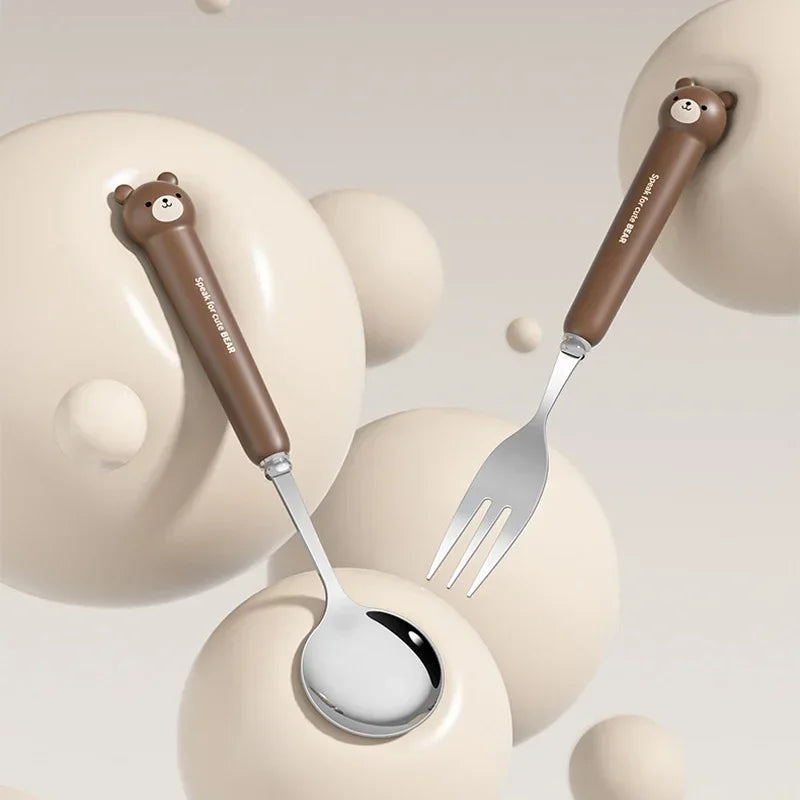 Kawaii utensils with bear handles on a light background