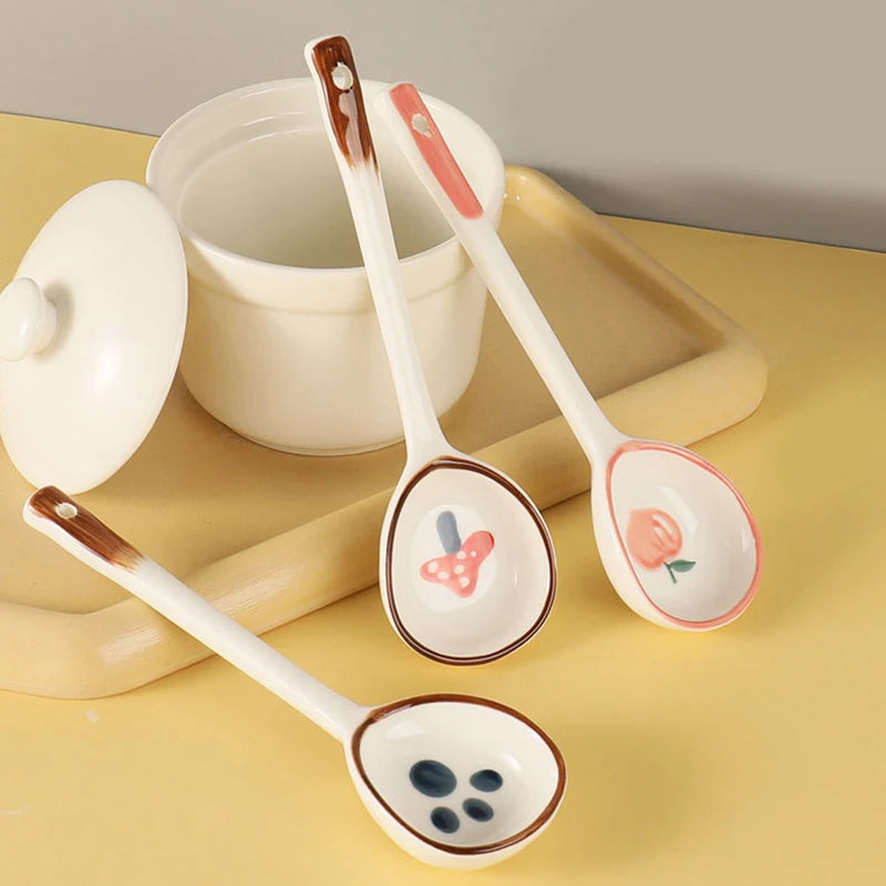Three kawaii spoons on a table