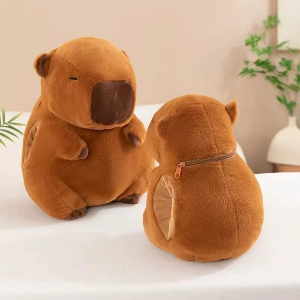 Two brown kawaii plush toys resembling bears on a white surface with a neutral background.