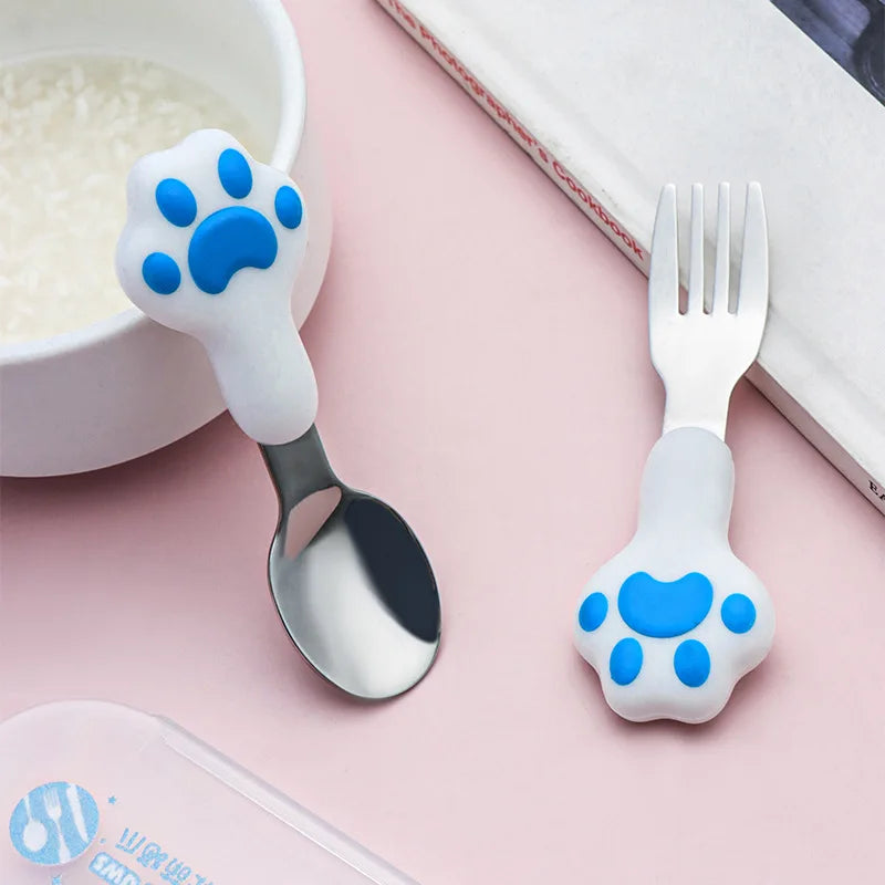 A set of blue and white paw shaped kawaii utensils
