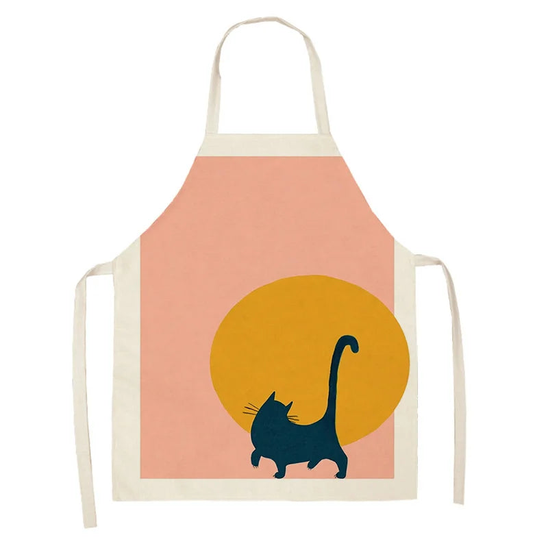 Kawaii apron with a cat silhouette design on a peach background