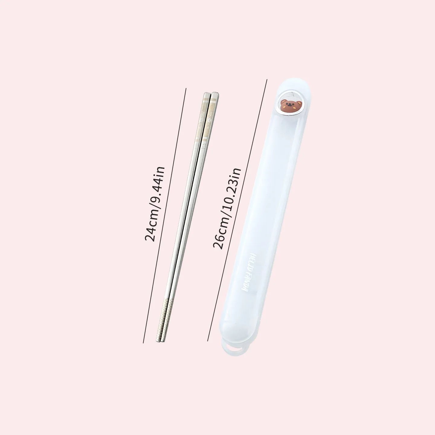 Kawaii chopsticks and a white holder with measurements on a pink background