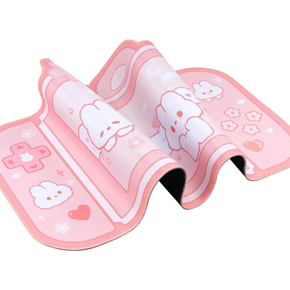 Pink mouse pad with Kawaii cartoon character design on a white background