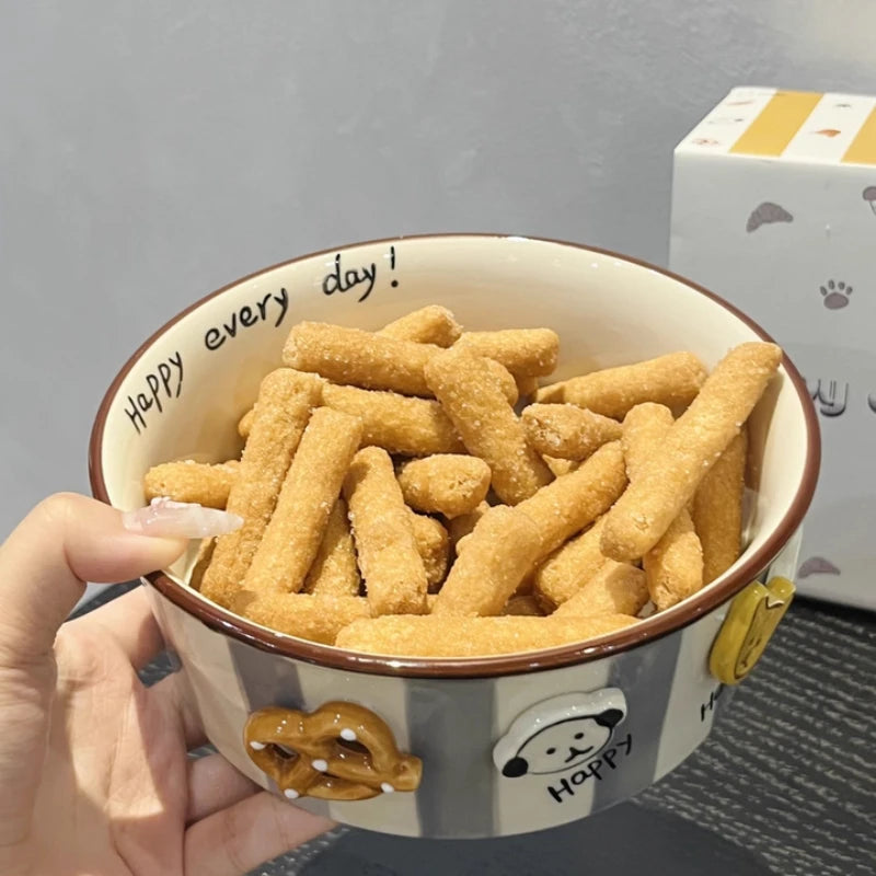 A close of a blue and white kawaii ramen bowl with food inside