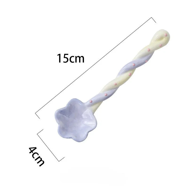 A purple and yellow kawaii spoon on a white background