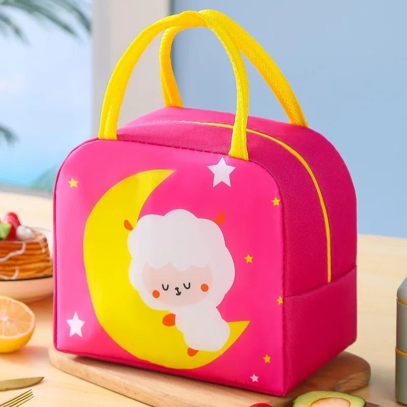 Pink kawaii lunch bag with cartoon design on a wooden table