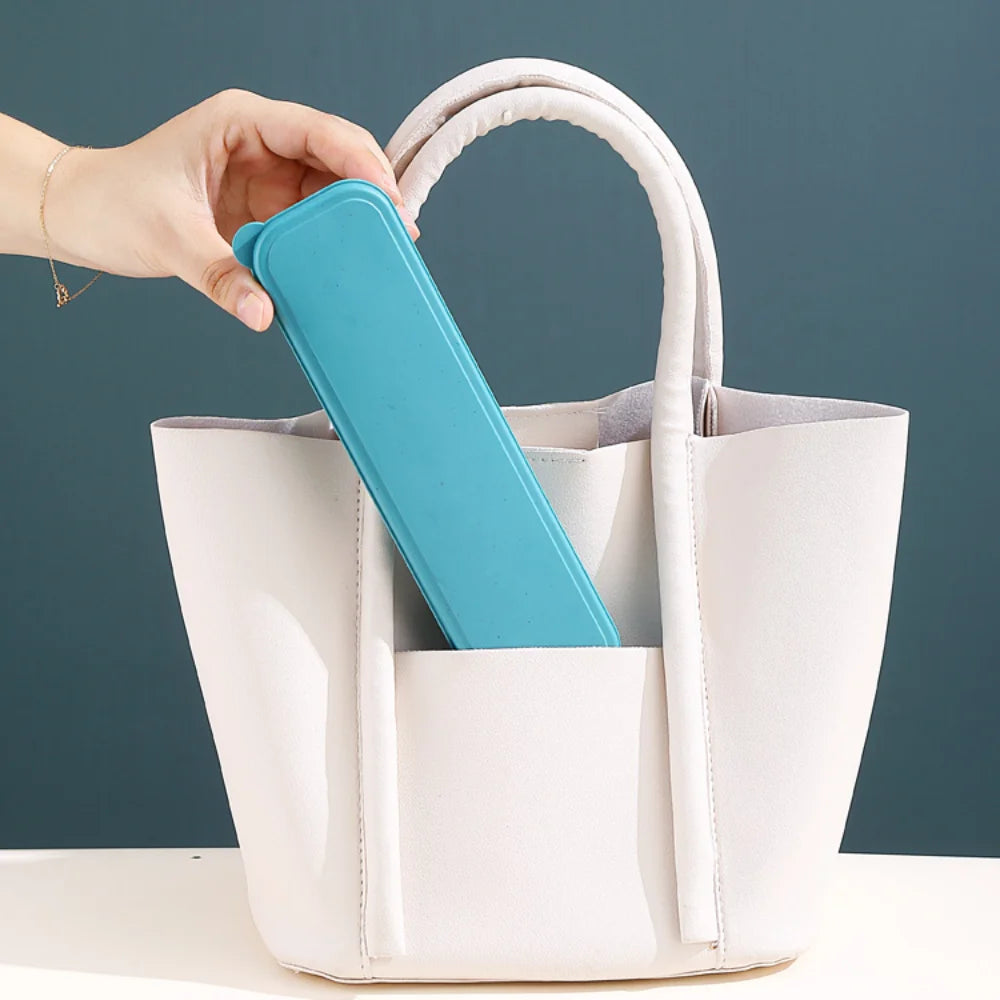 Someone placing a blue kawaii utensils into a bag