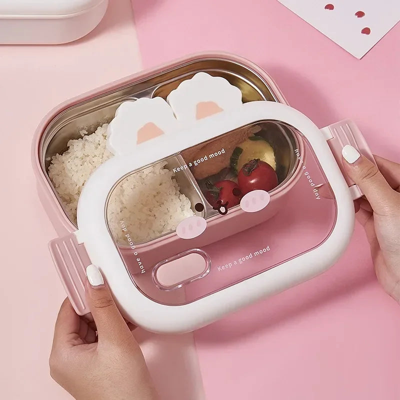 Pink and white kawaii bento box with cat ear design on a pink background