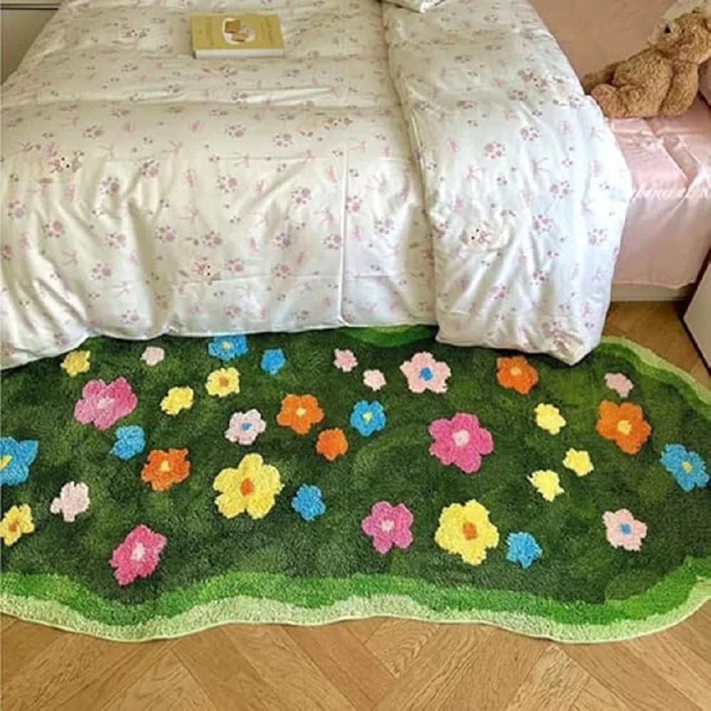 Floral-patterned kawaii rug on a wooden floor in front of a bed with floral bedding.