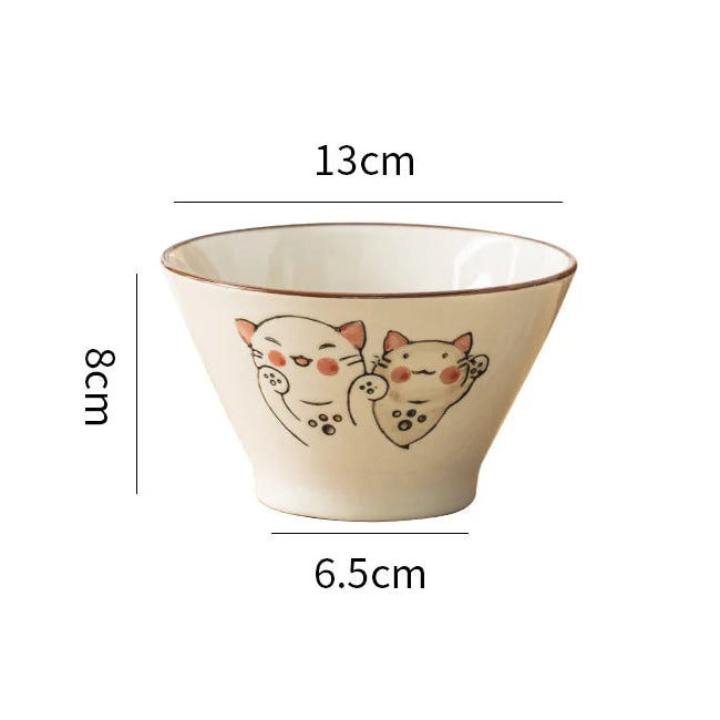 Ceramic kawaii ramen bowl with cat design and measurements on a white background