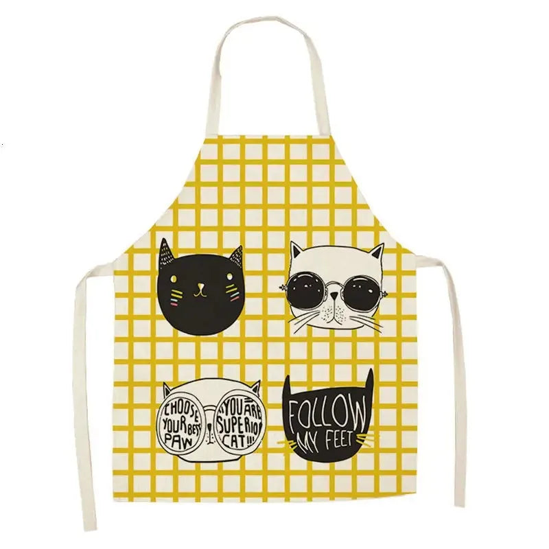 Yellow checkered apron with Kawaii cat illustrations and text on a white background
