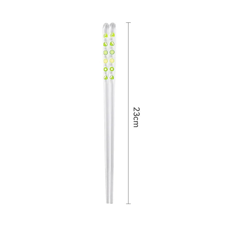 Pair of kawaii chopsticks with measurements on a white background