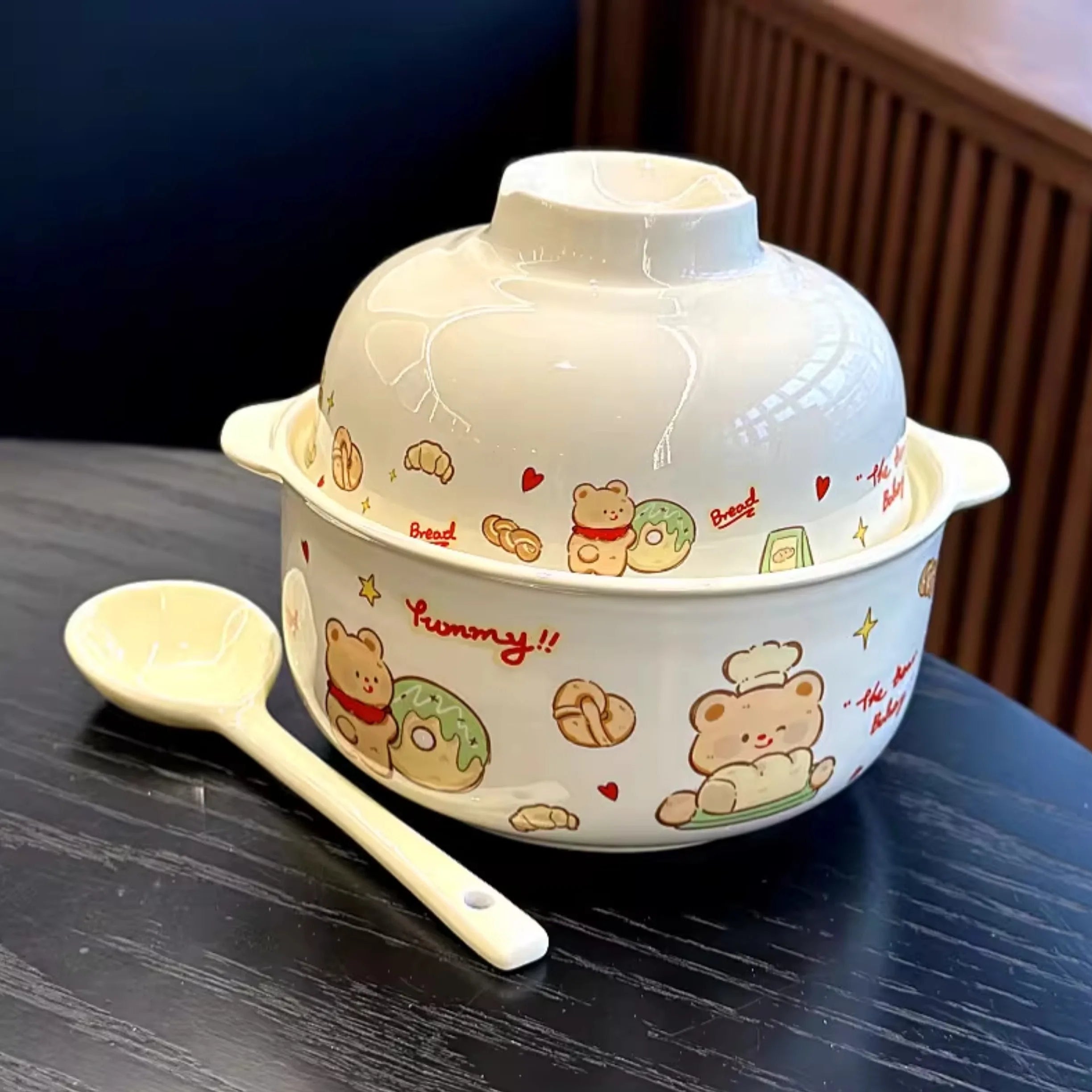 Ceramic kawaii ramen bowls with lid and cartoon bear designs on a dark surface