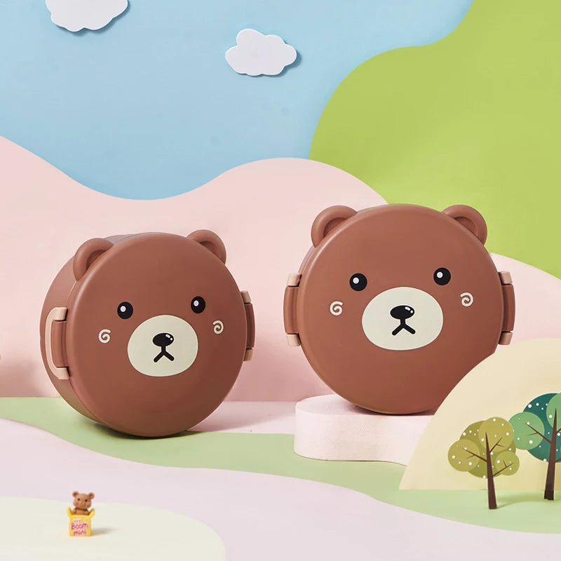 Two bear-shaped kawaii food containers with a scenic background