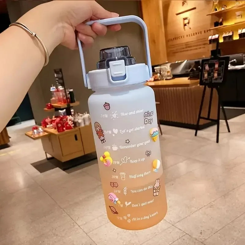 Person holding a colorful kawaii water bottle with text and graphics in an indoor setting