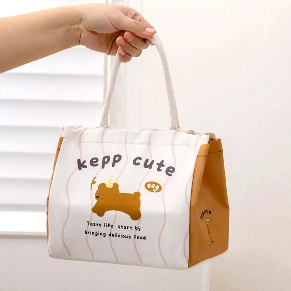 Hand holding a cute kawaii tote bag with cartoon dog design and 'kepp cute' text.