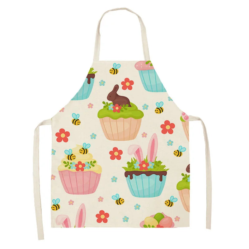 Children's kawaii apron with colorful cupcake and bunny design on a white background
