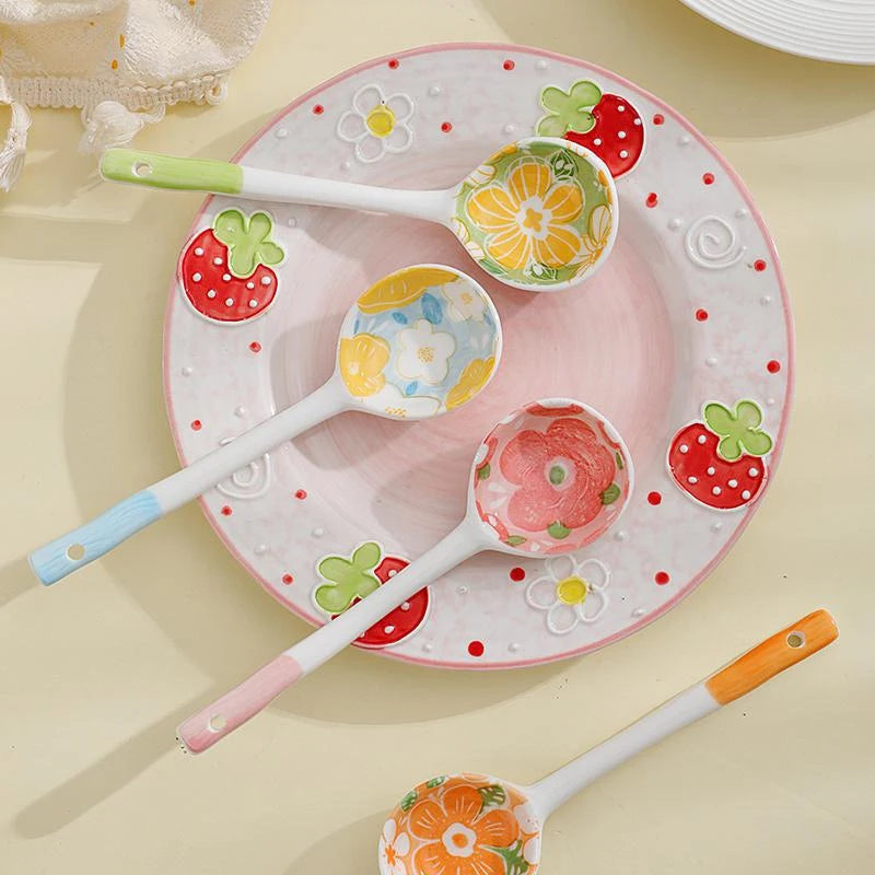 Four colorful kawaii spoons on a dish