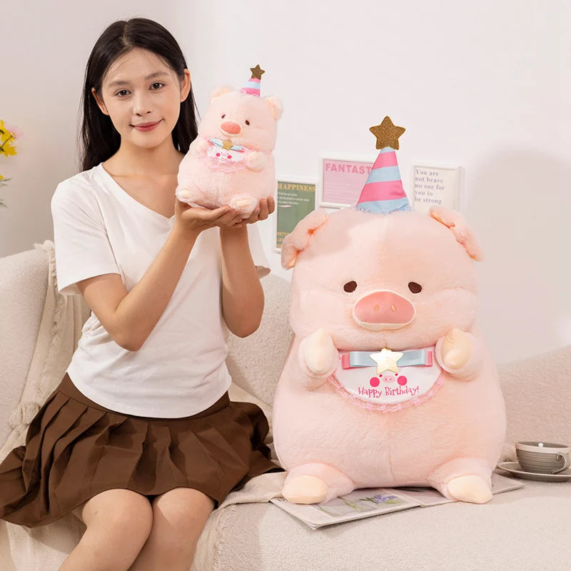 A woman holding up a kawaii pink pig plush toy
