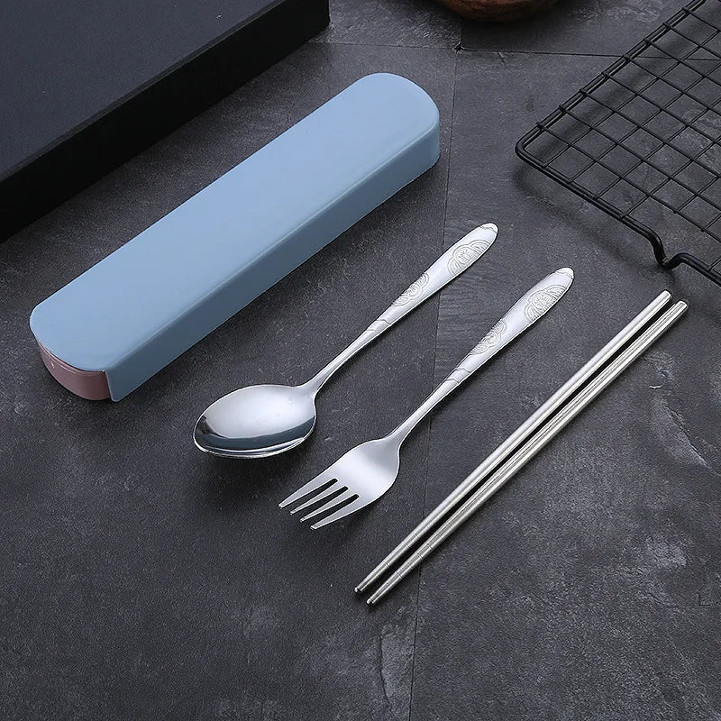 A group of steel kawaii utensils with a blue case
