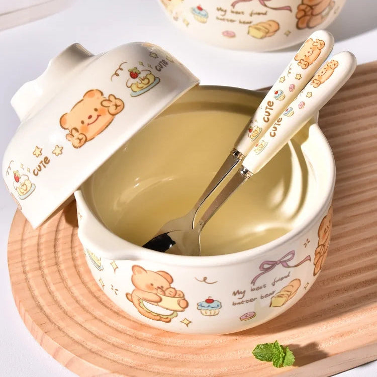 Cute ceramic kawaii ramen bowl set with cartoon designs on a wooden surface