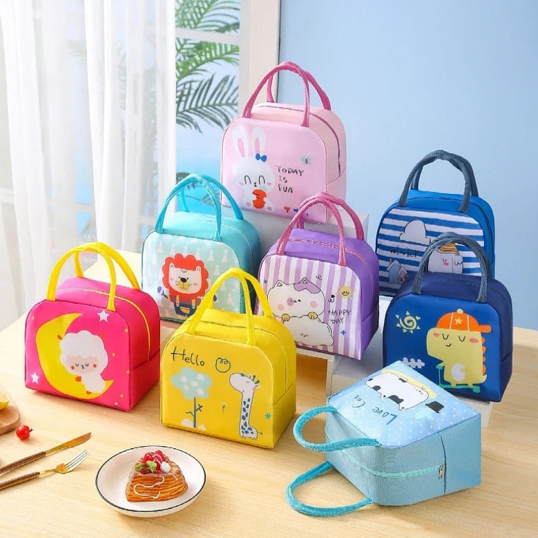 Colorful children's kawaii lunch bags with cartoon designs on a wooden table.