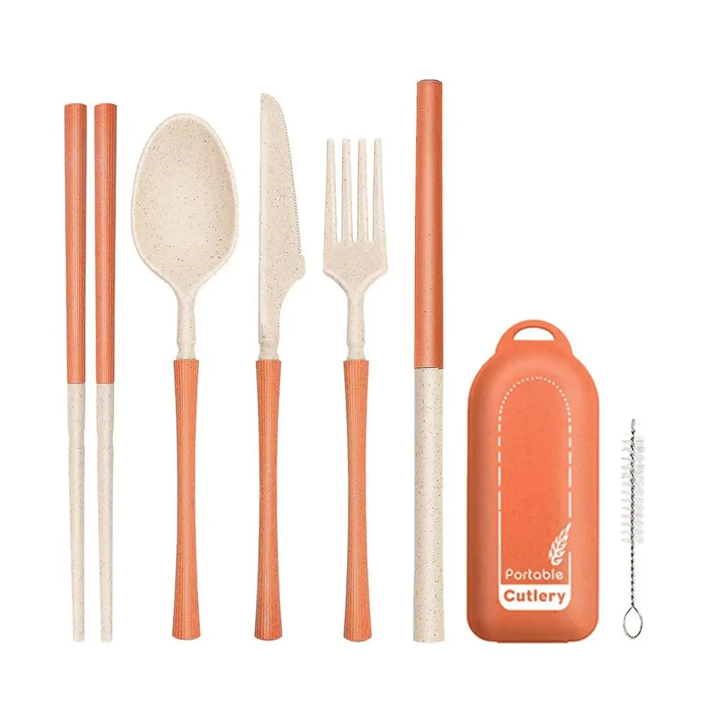 Set of orange and white kawaii utensils with carrying case on a white background