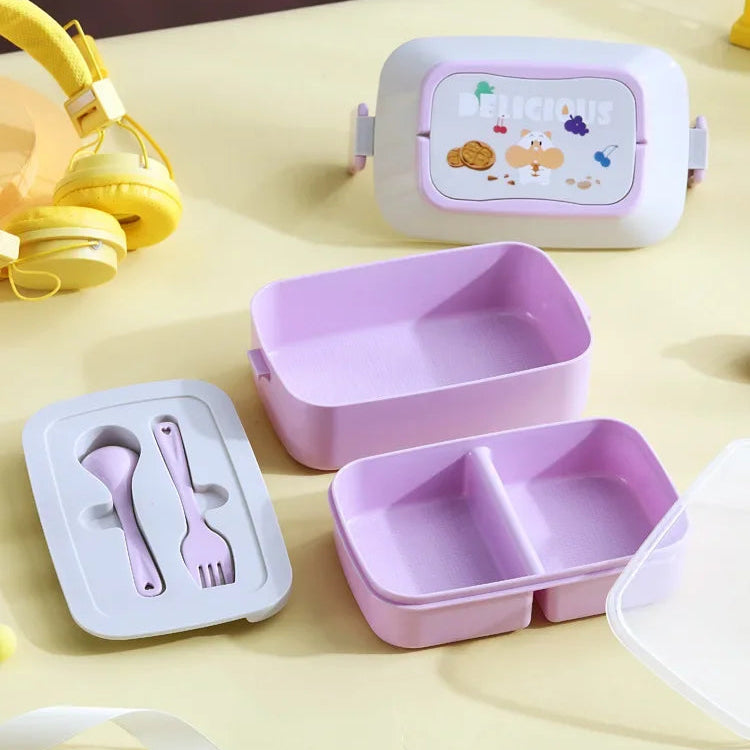 Purple children's kawaii lunch box set with compartments and cutlery on a yellow surface.