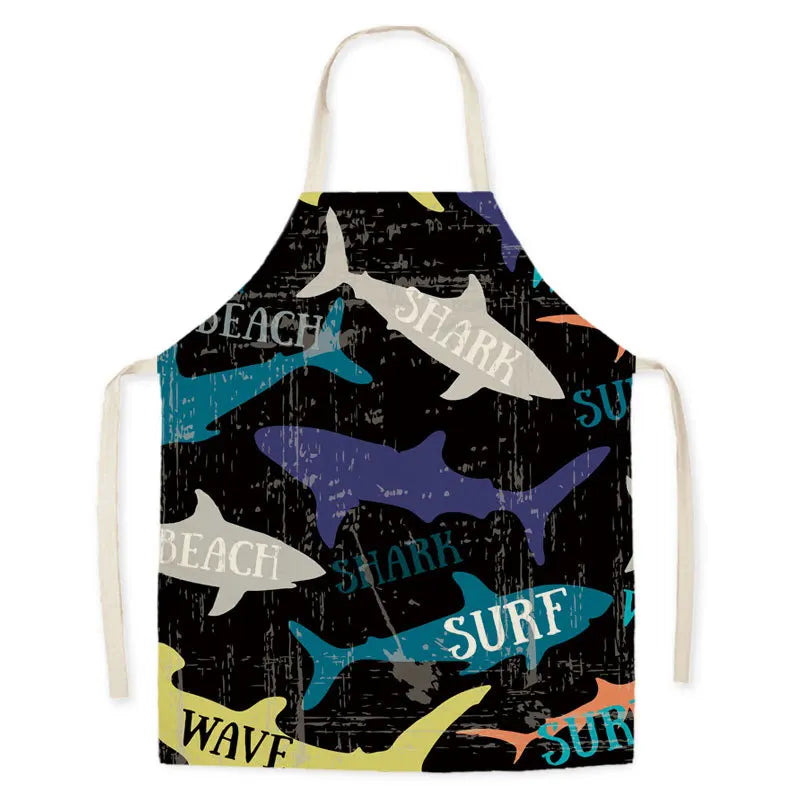 Kawaii apron with shark and beach-themed design on a black background