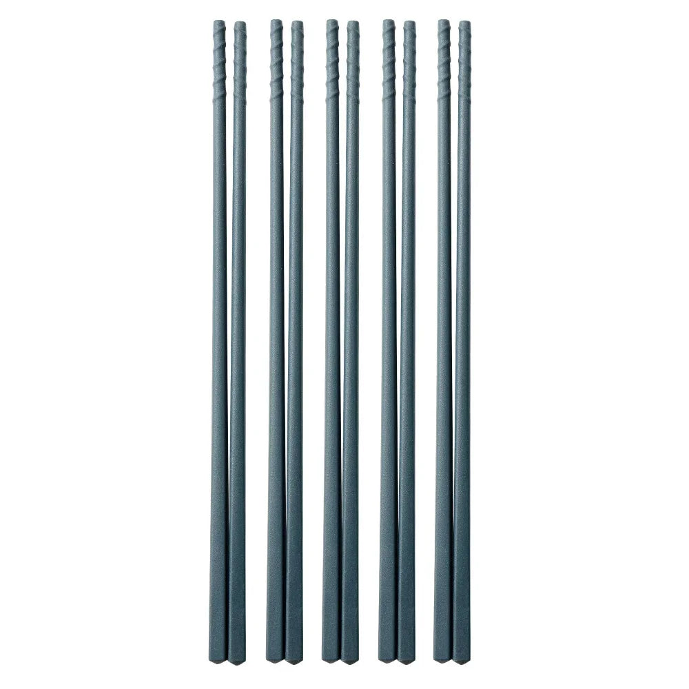 Set of six gray kawaii chopsticks on a white background
