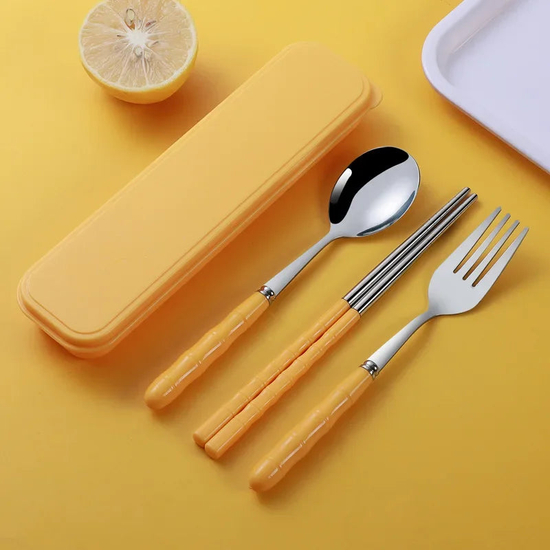 A set of yellow and steel kawaii utensils
