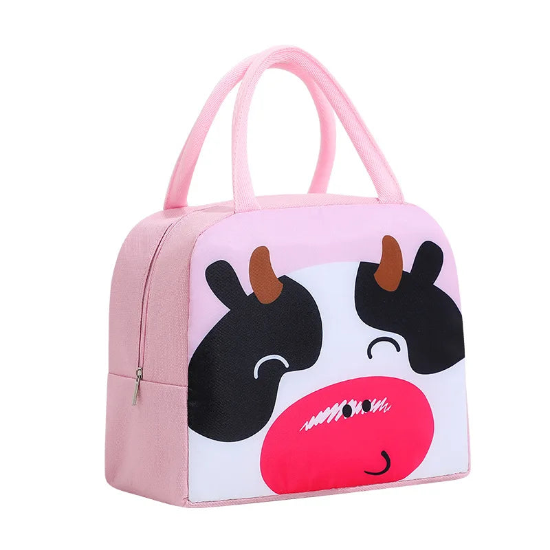 Pink kawaii lunch bag with a cow face design on a white background