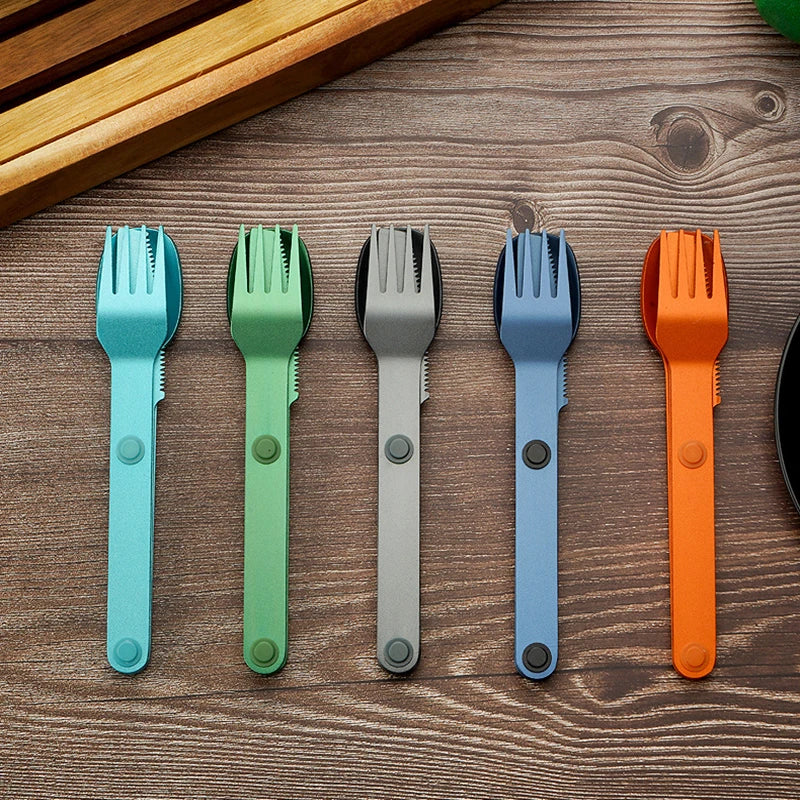 Five colorful kawaii utensils on a wooden surface