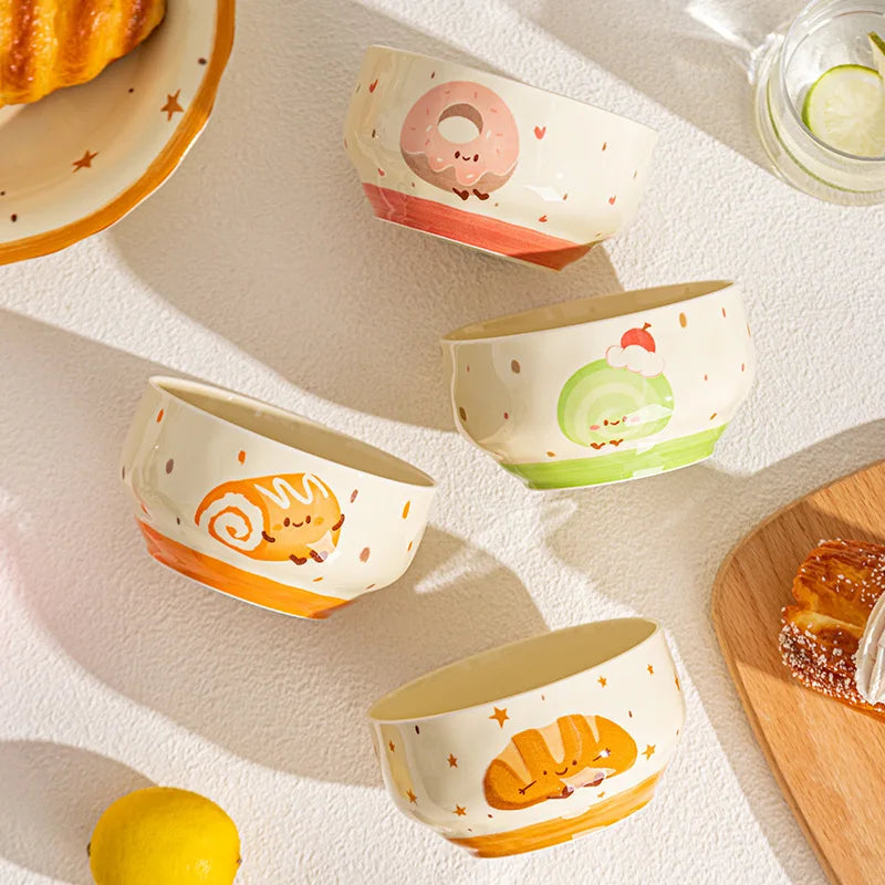 Four cartoon designed kawaii bowls on a table