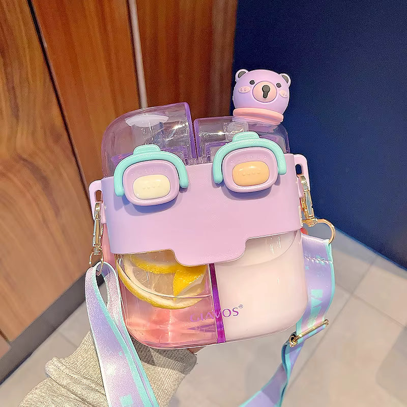 Pink and purple kawaii water bottle holder with bear-shaped clip on a wooden surface