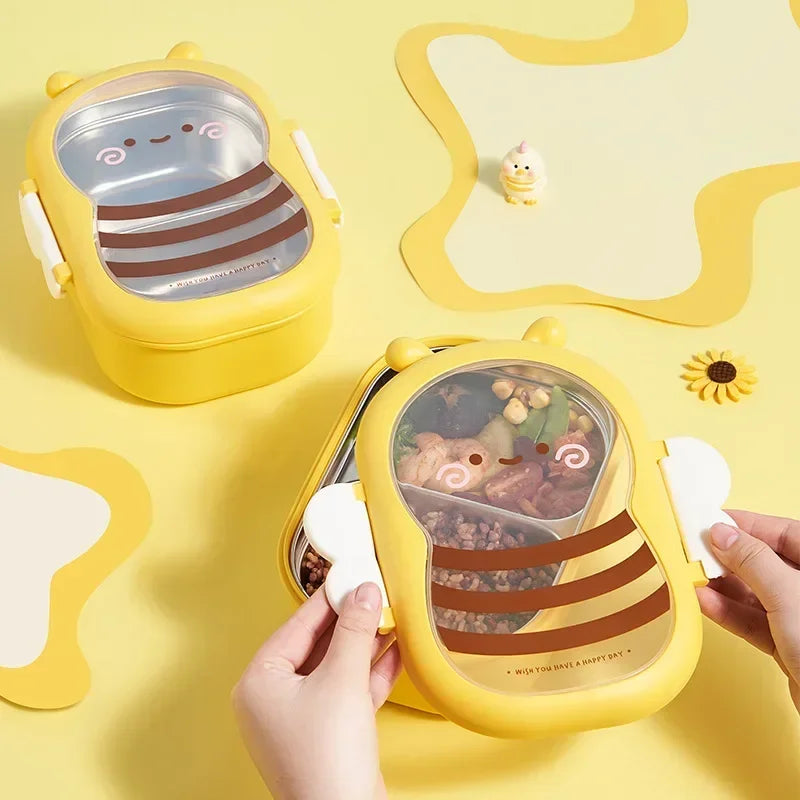 Yellow cartoon-style kawaii bento box with compartments on a yellow background