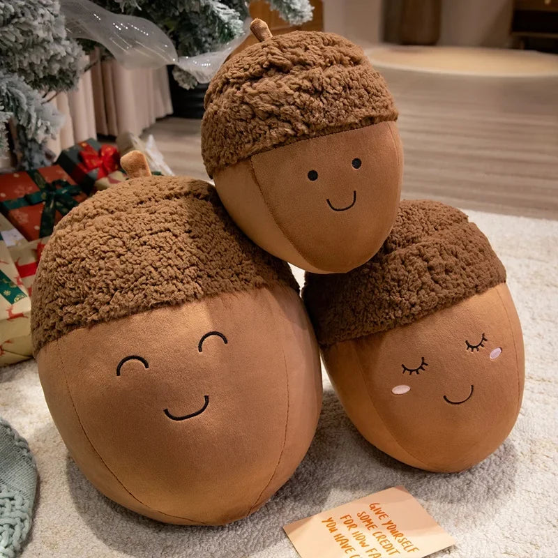 Three kawaii plush acorn-shaped toys with faces on a carpeted floor.