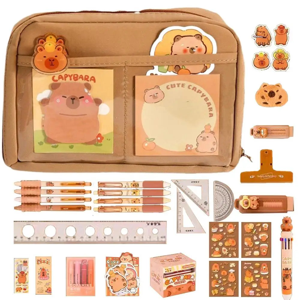 Cute stationery set with kawaii cartoon animal design on a beige background