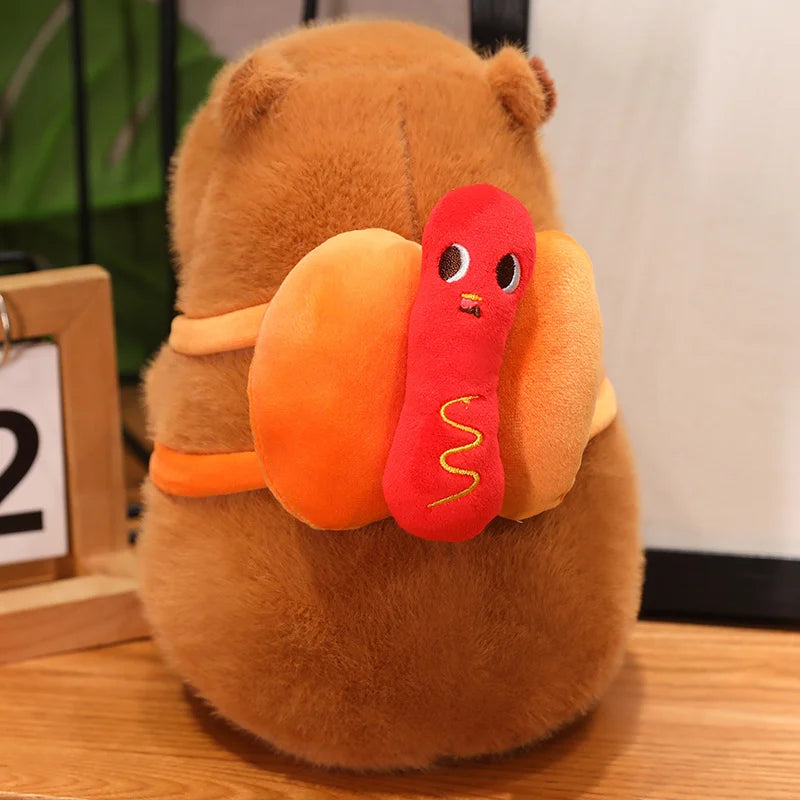 Kawaii plush toy resembling a bear with a red worm on a wooden surface